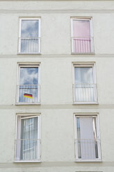 Germany, Bavaria, Munich, German flag on windows - LFF00153