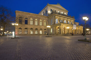 Germany, Hannover, View of illuminated opera house at night - WDF00711