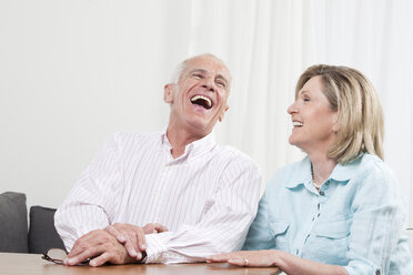 Senior couple enjoying, smiling - CLF00887