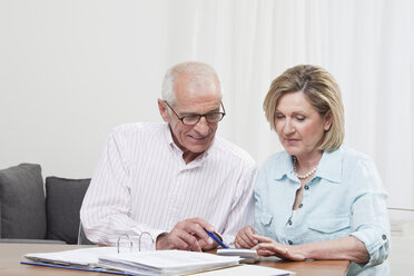 Senior couple doing paperwork - CLF00847