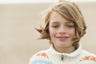 Germany, North Sea, St.Peter-Ording, Boy (8-9) smiling, portrait, close-up - WESTF15085
