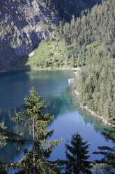 Austria, Tyrol, View of blindsee lake through mountain - CSF013585