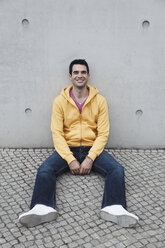 Germany, Berlin, Man smiling, portrait - WESTF015178