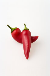 Red chilli peppers on white background - PSF000582