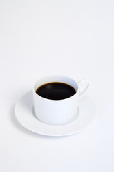 Cup of hot black coffee on white background - PSF000597