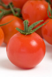 Ripe red cherry tomatoes on white background - PSF000603