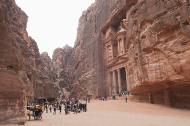 Jordan, Petra, View of tourists at temple - NHF001236