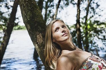 Germany, Cologne, Woman looking away, smiling - JOF000130