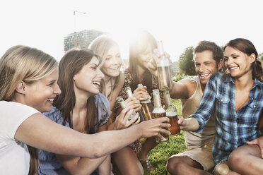 Germany, Cologne, Man and women enjoying beer - JOF000150