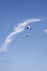 Germany, Moselle, Person parachuting in the sky - CSF013656