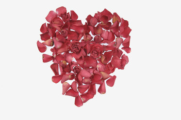 Red heart-shape made by rose petals - ASF004161