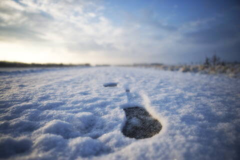 Germany, Close up of footstep in snow stock photo