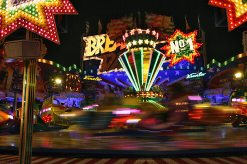 Germany, Stuttgart, View of carousel at night - HKF000350