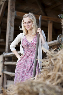 Germany, Saxony, Young woman at the farm, portrait - MBF001030