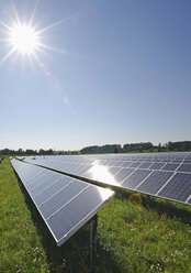 Germany, Bavaria, View of solar panels in field - WBF000105