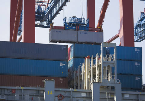 Germany, Hamburg, Cargo container loading at port stock photo