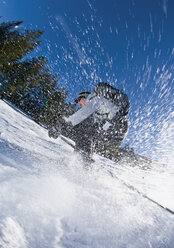 Austria, Young man skiing - WBF000682