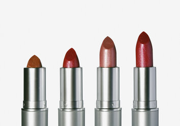 Row of red lipsticks, close up - WBF000346