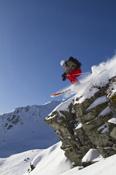 Austria, Tirol, Kitzsteinhorn, Man skiing in powder snow - FFF001126