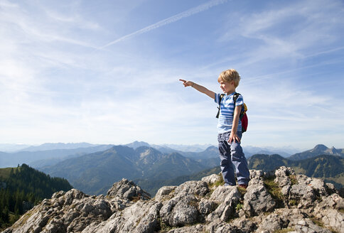 Germany, Bavaria, Boy (4-5 Years) on mountain summit looking at view - HSIF000024