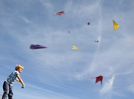 Germany, Bavaria, Boy (4-5 Years) playing with paper planes - HSIF000001