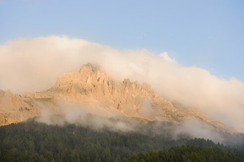 Italy, Dolomites, View of latemar mountains at sunset - RNF000552