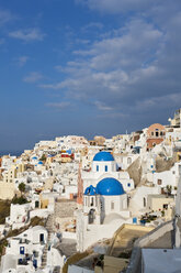 Europe, Greece, Aegean Sea, Cyclades, Thira, Santorini, Oia, View of blue dome and bell tower of a church - FOF002814