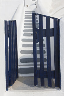 Greece, Cyclades, Thira, Santorini, Open blue gate with staircase - FOF002832