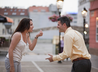 Croatia, Zagreb, Woman and man arguing on street - HSIF000121