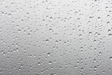 Waterdrops on metallic-silver car , close up - CSF013974