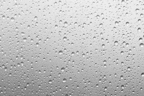 Waterdrops on metallic-silver car , close up - CSF013974