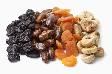 Variety of dried fruits on white background - MAEF002829