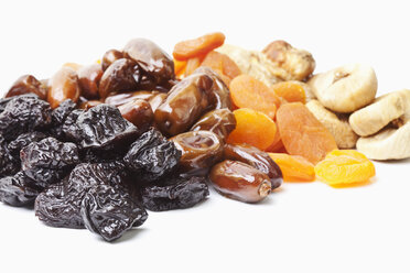 Variety of dried fruits on white background - MAEF002830