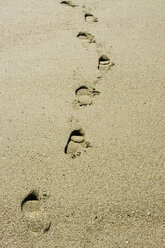 France, Aude, Les Portes du Roussillion, Footprints on sandy beach - MUF000961