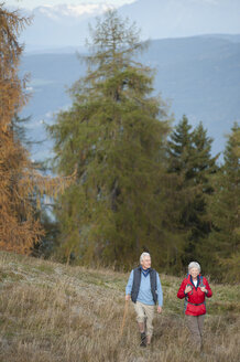 Italy, South Tyrol, Mature couple hiking on dolomites - WESTF015922