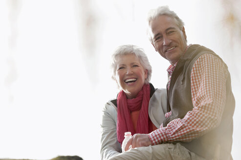 Italy, South Tyrol, Mature couple hiking on dolomites, smiling, portrait - WESTF015941