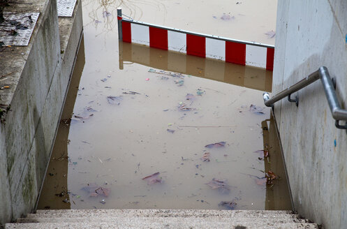 Germany, Wuerzburg, View of flood water near stairway and barrier - ND000179