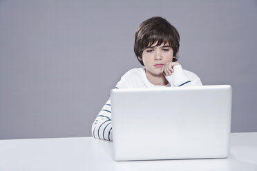 Boy using laptop - WESTF016073