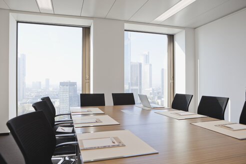 Germany, Frankfurt, Conference room table ready for meeting - SKF000415