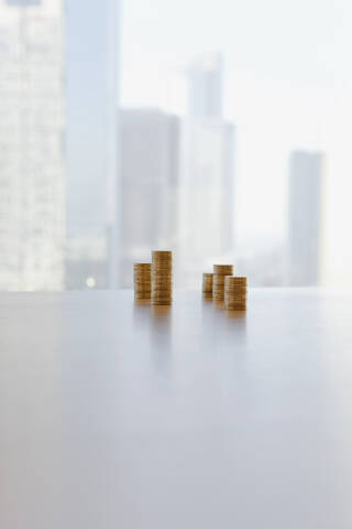 Germany, Frankfurt, Stack of coins in office stock photo