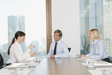 Germany, Frankfurt, Business people discussing in conference room - SKF000533