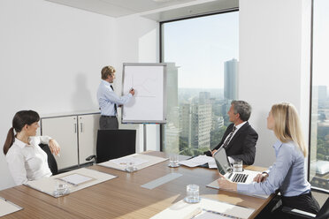 Germany, Frankfurt, Business people in conference room - SKF000538