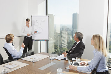 Germany, Frankfurt, Business people in conference room - SKF000540