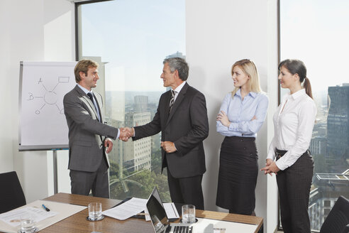 Germany, Frankfurt, Business people in conference room - SKF000542