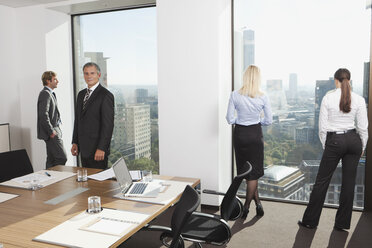 Germany, Frankfurt, Business people in conference room - SKF000543
