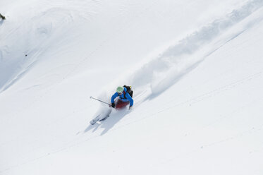 Austria, Kleinwalsertal, Woman skiing - MRF001245