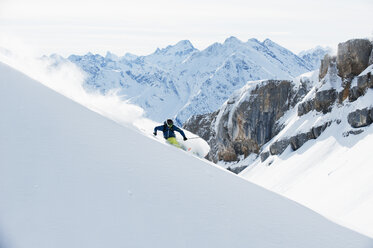 Austria, Kleinwalsertal, Man skiing - MRF001281