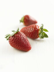 Three strawberries, close up - KSWF000693