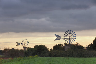 Spain, Balearic Islands, Majorca, View of windmills at dusk - SIEF000767