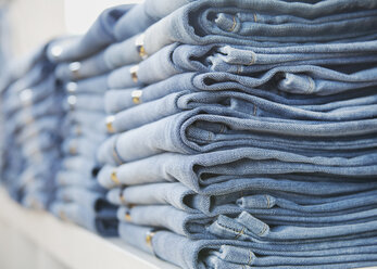 Close-up of stacked Jeans - WBF000953